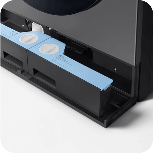 Dwa pojemniki na detergent w pralce.