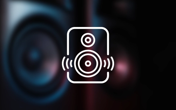 Піктограма динаміка, що випромінює звук, що представляє вбудовані динаміки проектора.