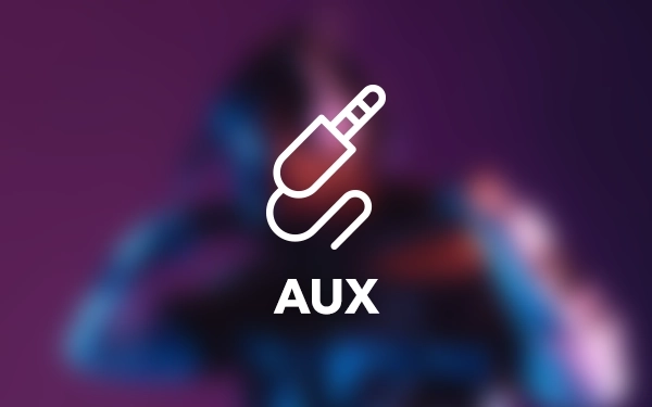 Символ AUX (допоміжний аудіовхід) на розмитому графічному фоні.