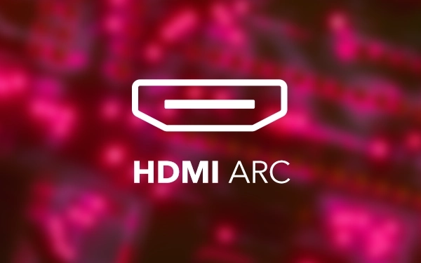 Напис HDMI (High-Definition Multimedia Interface) ARC (Audio Return Channel) на фоні у відтінках рожевого та червоного