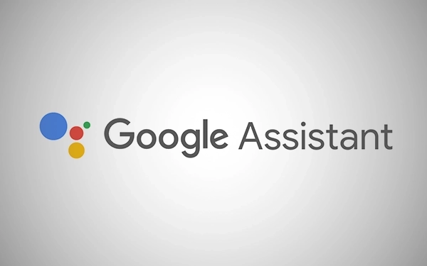 Логотип Google Assistant з кольоровими крапками поруч із текстом на сірому фоні