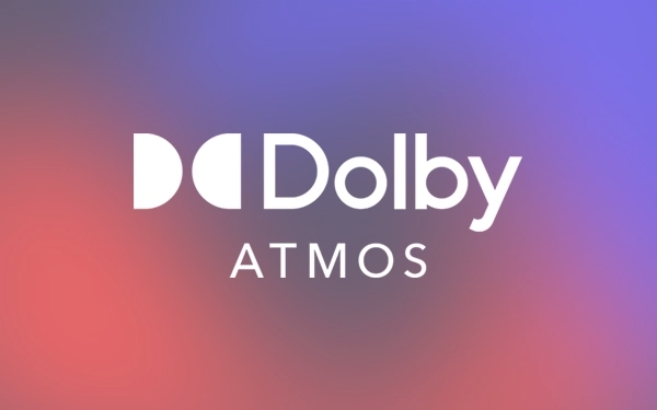 Логотип Dolby Atmos на фіолетово-червоному градієнтному фоні
