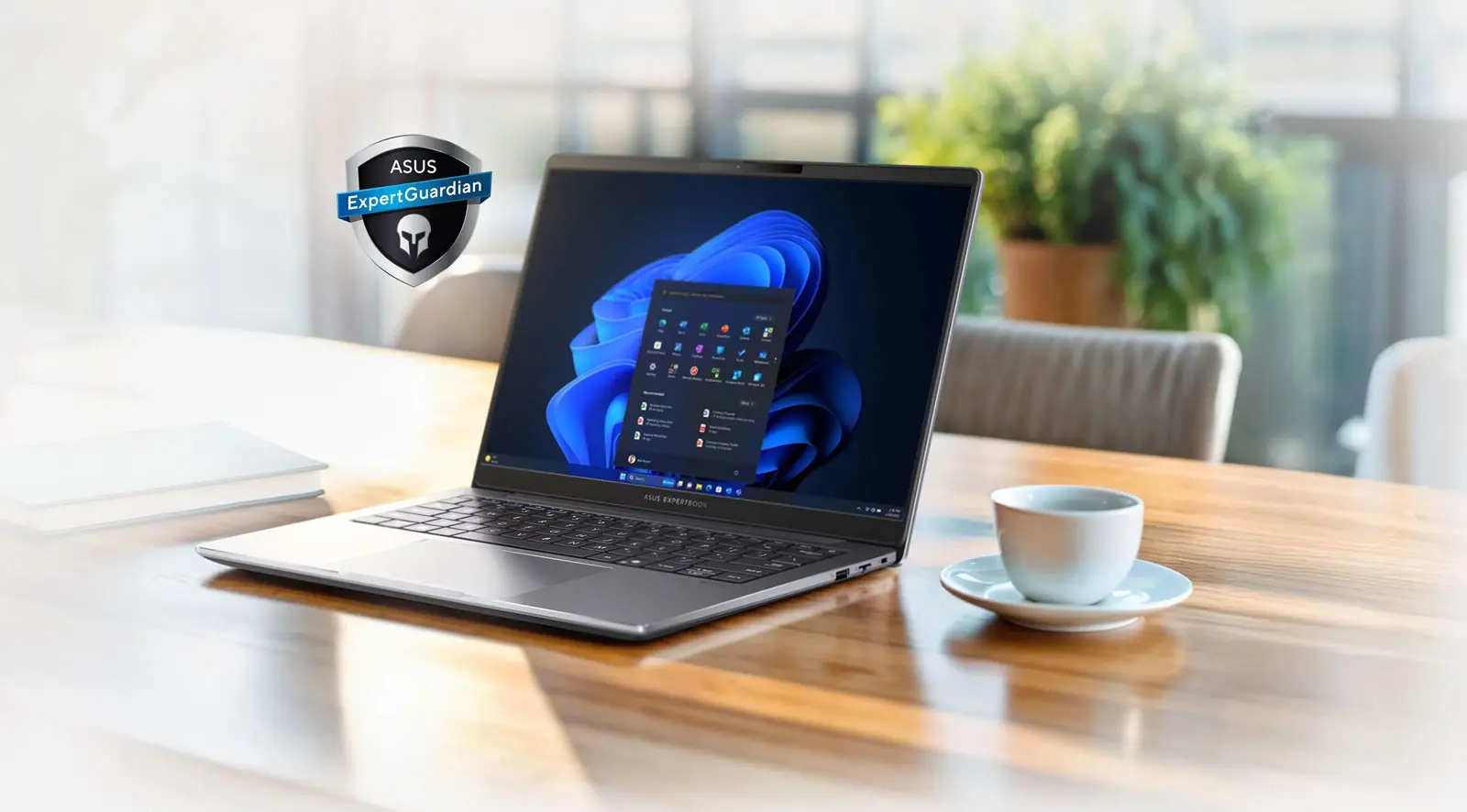 ASUS ExpertBook PM3 на дерев'яному фоні столу — на екрані робочого столу Windows 11 — поруч із логотипом ASUS ExpertGuardian.