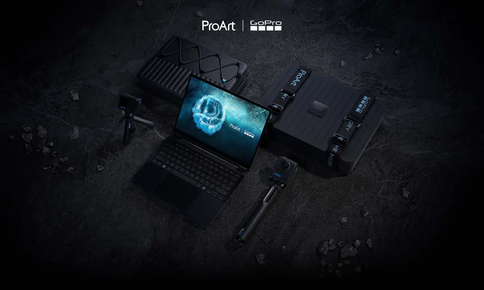 Ноутбук ASUS ProArt GoPro Edition на абстрактному чорному фоні.