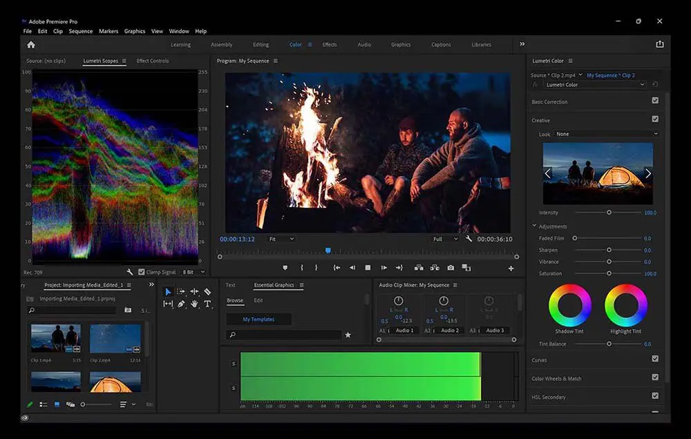 Екран ноутбука з відкритим Adobe Premiere Pro та фільмом. Поруч панелі корекції кольору.