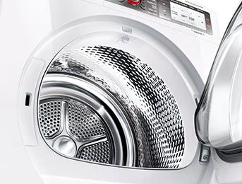 Дверцята сушарки відкриті