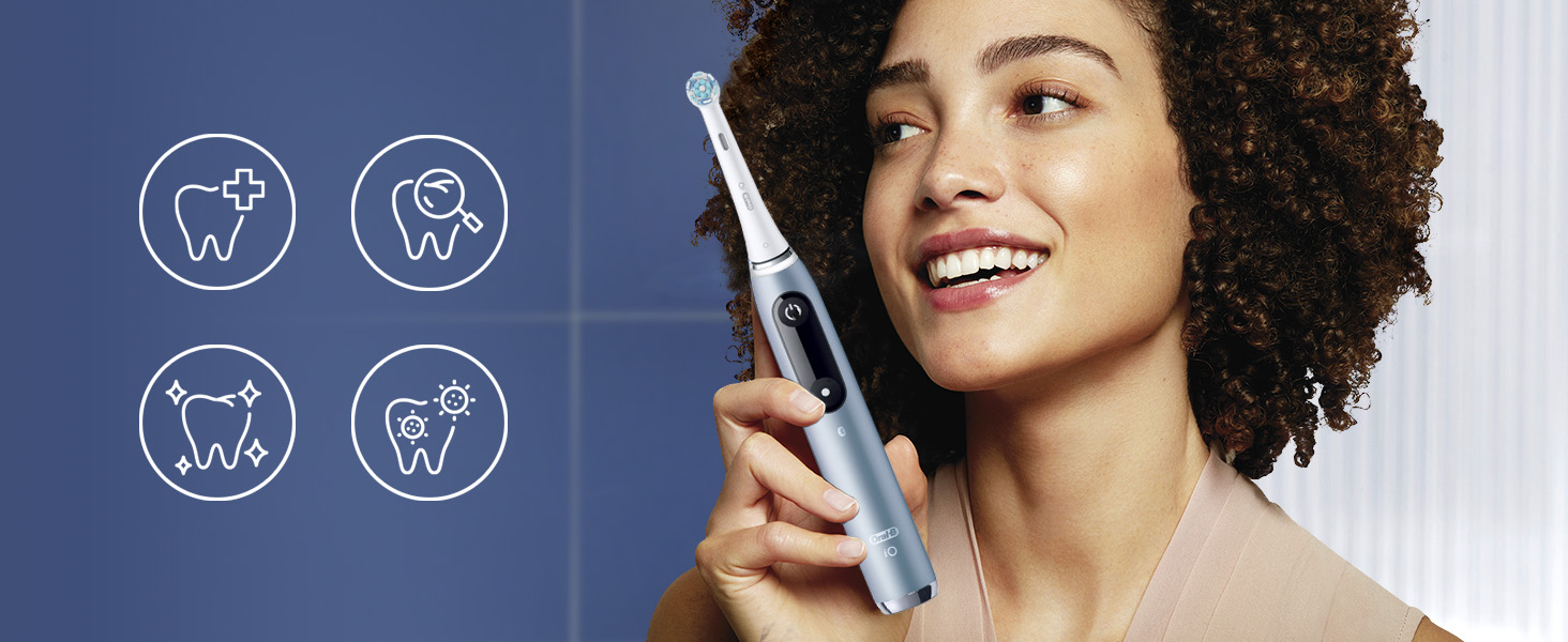 Жінка з щіткою oral-b