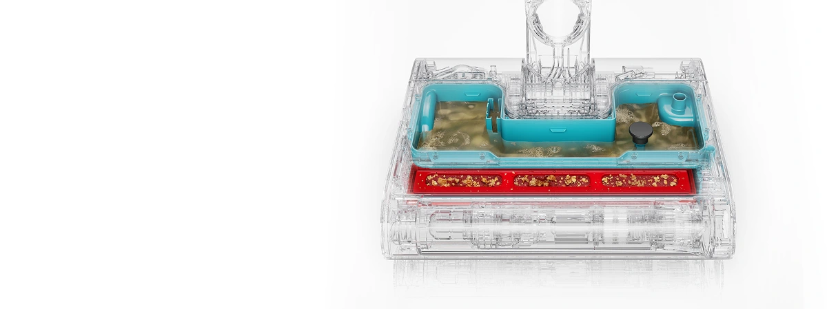 Поперечний розріз електричної щітки з видимим резервуаром для сухого бруду та окремим резервуаром для брудної води.