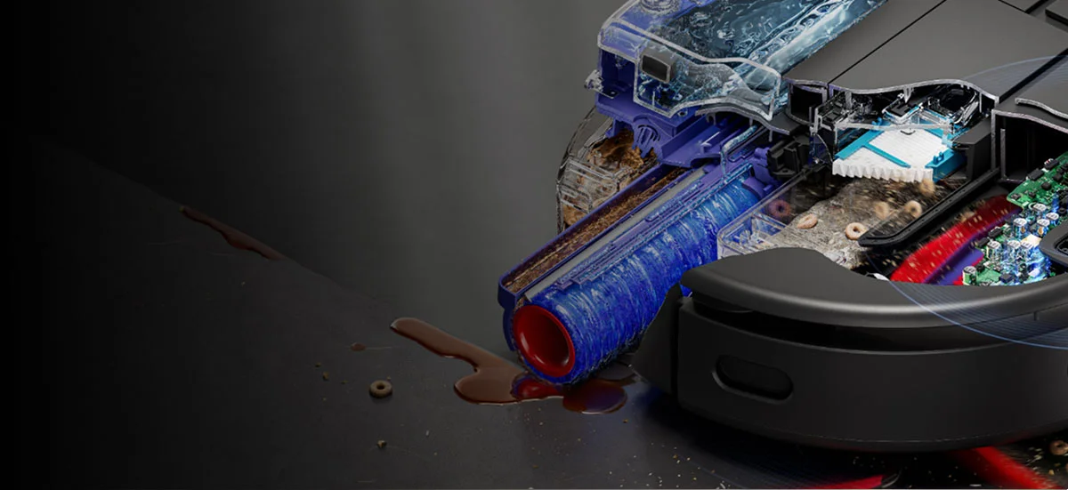 Поперечний розріз робота Dyson під час процесу прибирання: замочування валика чистою водою, змивання плям, збирання сухого бруду