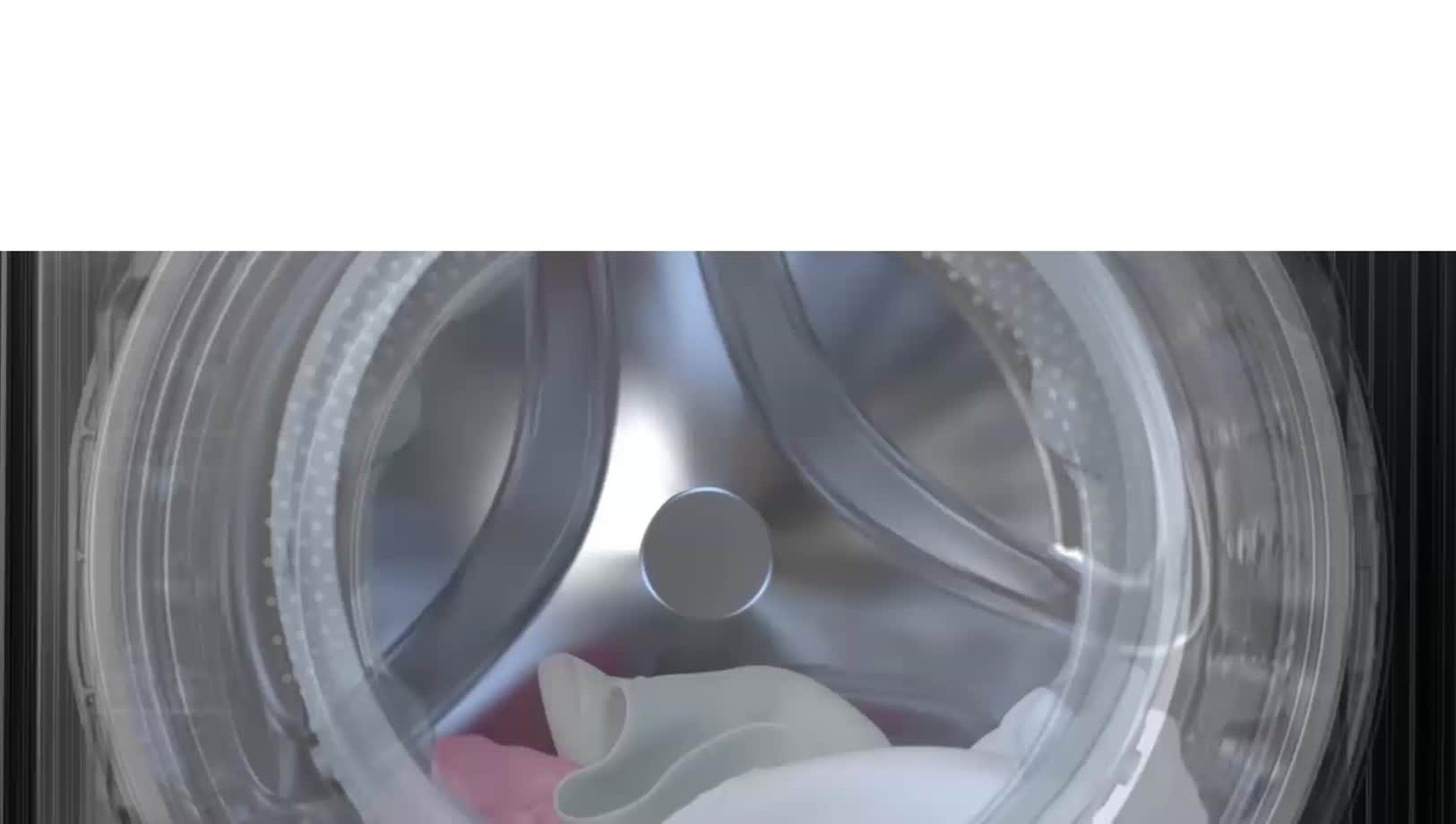 There is a washing machine door. Water is spouting from four directions inside the door.