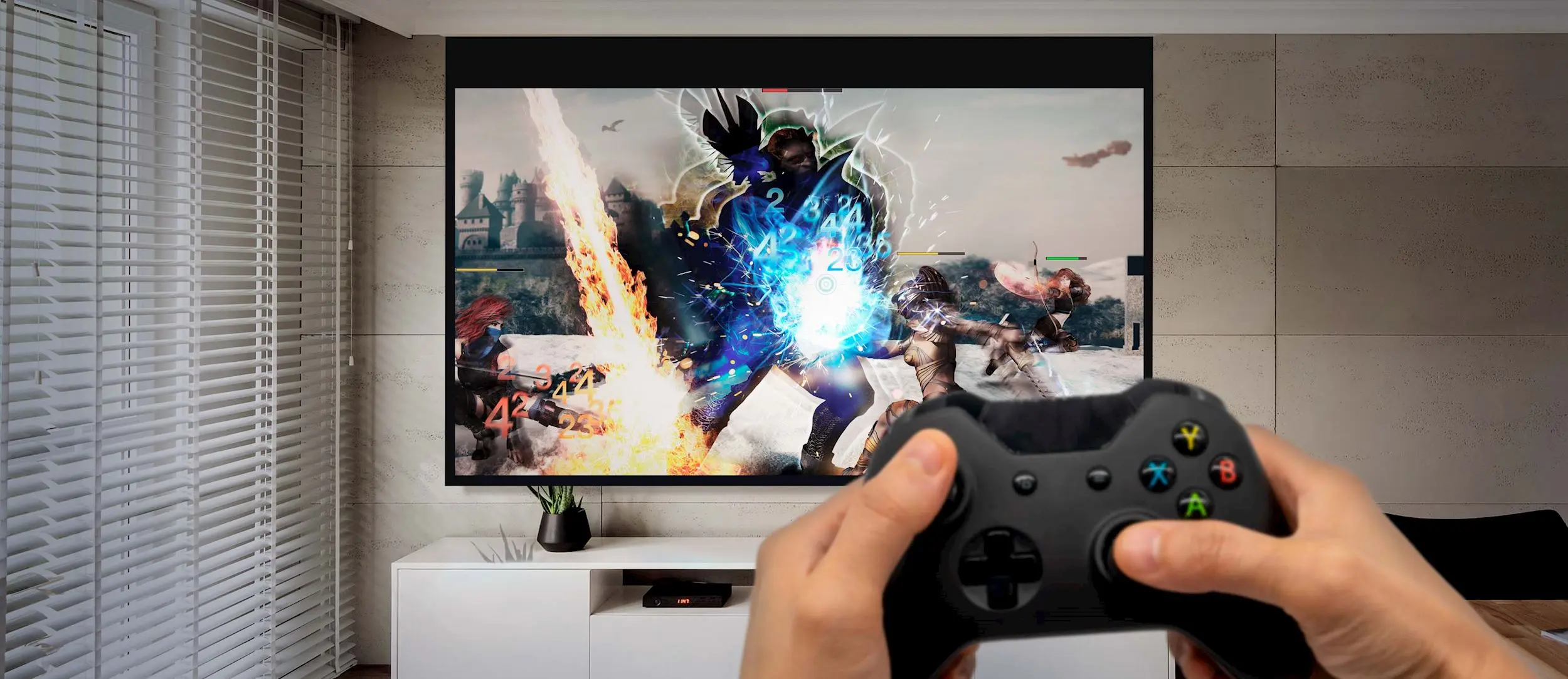 Людина з контролером грає в гру на великому екрані, що відображається проектором Optoma GT2000HDR