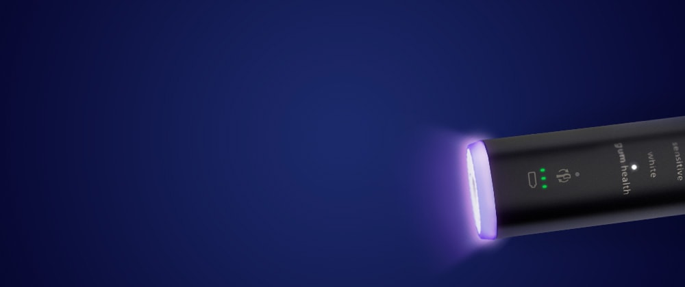 Крупний план нижньої частини зубної щітки, де розташований датчик.