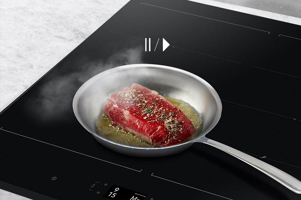 функція паузи зменшує потужність нагріву на всіх полях одночасно