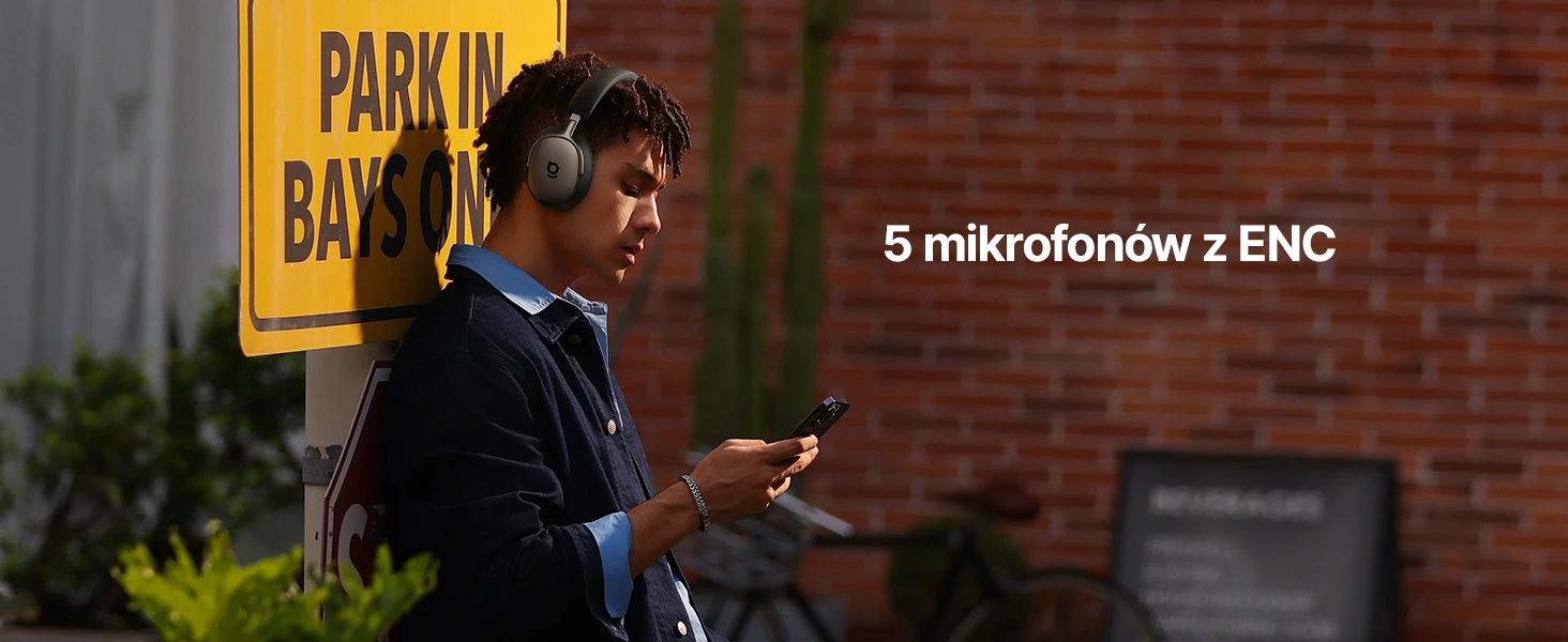 Показано користувача чорних навушників XH1 та особливості вбудованих мікрофонів і функції ENC (екологічного шумозаглушення).