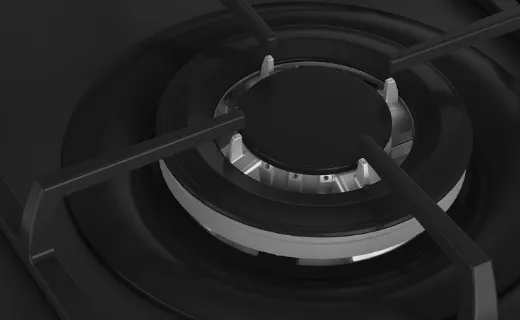 Крупний план чавунних решіток газової варильної поверхні