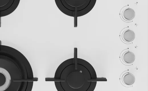 Крупний план ручок газової варильної поверхні; темний варіант