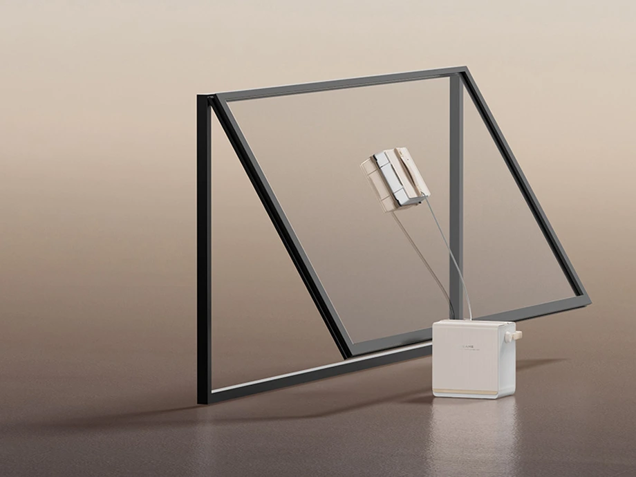 Робот-пральник працює на похилій віконній рамі, підключеній до базового блоку, що стоїть на підлозі.