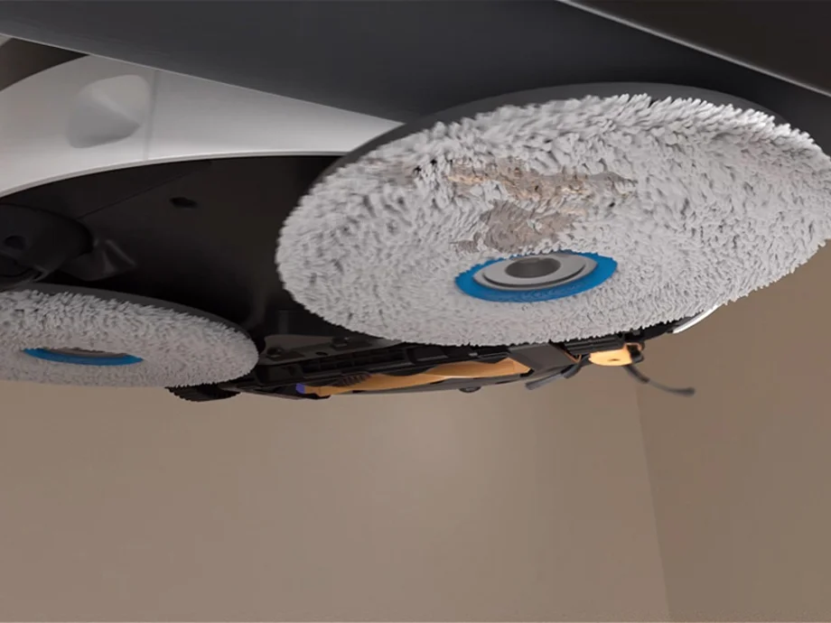 Крупний план губок для миття підлоги робота-пилососа