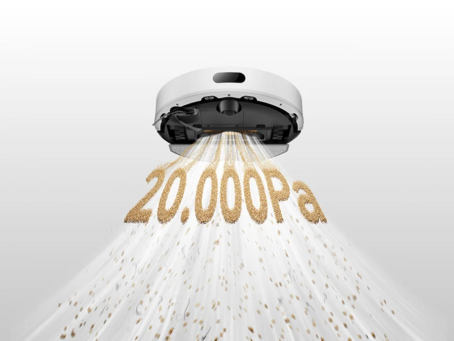 Білий робот-прибиральник всмоктує бруд, а під ним написано 20 000 Па.