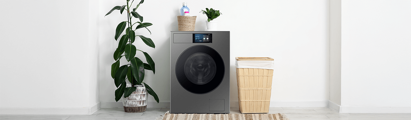 Zdjęcie przedstawia nowoczesną pralkę Samsung w eleganckim wnętrzu.
